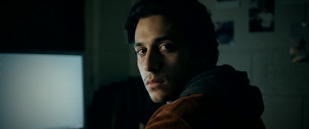 In the dream, Eli looks back over his shoulder from the desk